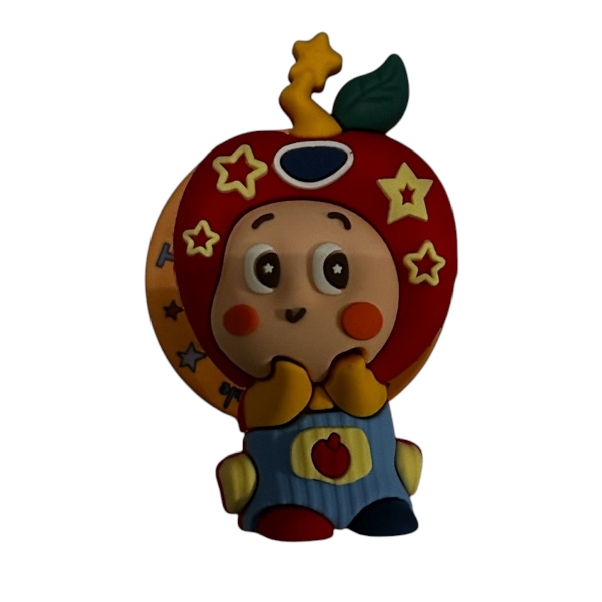 Cavalla Goods apple-inspired character phone grip with star motifs and a cheerful face for a secure smartphone hold.